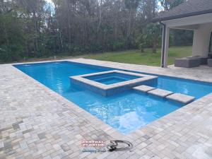 Pool and Spa, paver decking, Tahoe blue interior finish, deck jets
