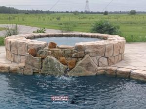 Spa w/ Ricorock spillway,rock coping, rock tile